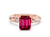 Rose gold Emerald Cut Solitaire Diamond Engagement Ring with Twisted Pave Band and Four-Prong Setting