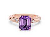 Rose gold Emerald Cut Solitaire Diamond Engagement Ring with Twisted Pave Band and Four-Prong Setting