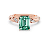 Rose gold Emerald Cut Solitaire Diamond Engagement Ring with Twisted Pave Band and Four-Prong Setting