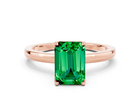 Rose gold Emerald Cut Solitaire Diamond Ring with Thin Band and Four-Prong Setting