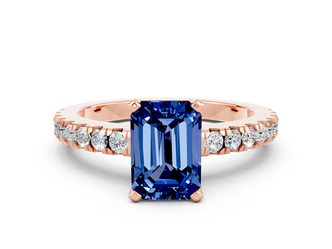 Rose gold Emerald Cut Solitaire Diamond with Pavé Band and Four-Prong Setting