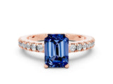 Rose gold Emerald Cut Solitaire Diamond with Pavé Band and Four-Prong Setting