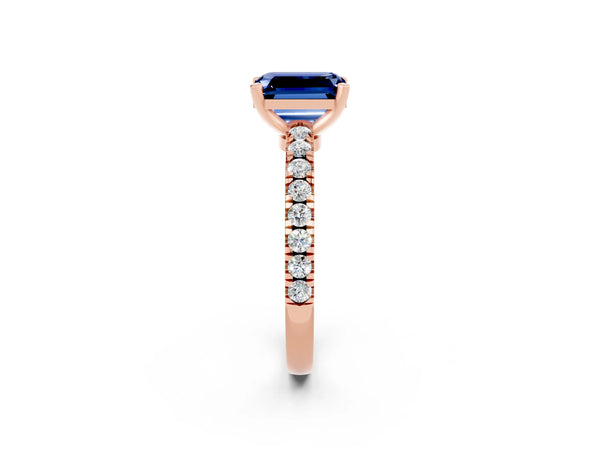 Rose gold Emerald Cut Solitaire Blue Sapphire with Pavé Band and Four-Prong Setting