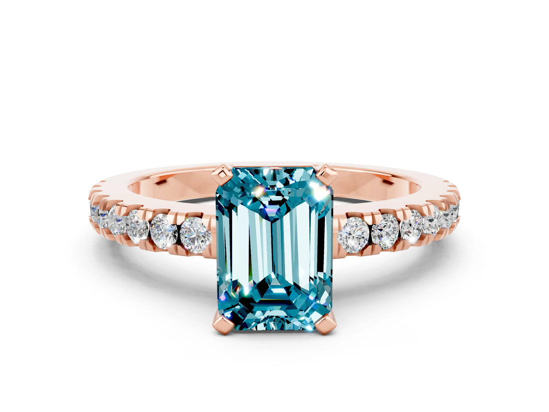 Rose gold Emerald Cut Solitaire Diamond with Pavé Band and Four-Prong Setting