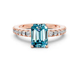 Rose gold Emerald Cut Solitaire Diamond with Pavé Band and Four-Prong Setting