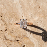 Rose gold Emerald Cut Solitaire Engagement Ring with Four-Prong Setting on a Classic Band_15