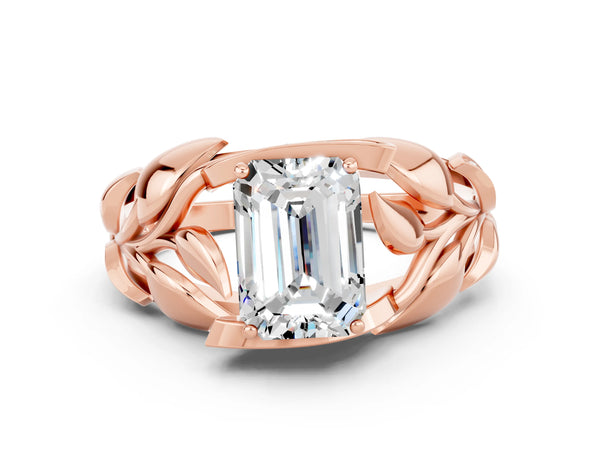 Rose gold Emerald Cut Moissanite Leaf-Inspired Engagement Ring with Round Accents and Prong Setting