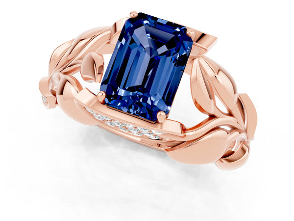 Rose gold Emerald Cut Blue Sapphire Leaf-Inspired Engagement Ring with Round Accents and Prong Setting