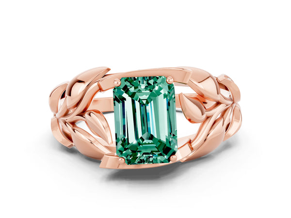Rose gold Emerald Cut Green Sapphire Leaf-Inspired Engagement Ring with Round Accents and Prong Setting