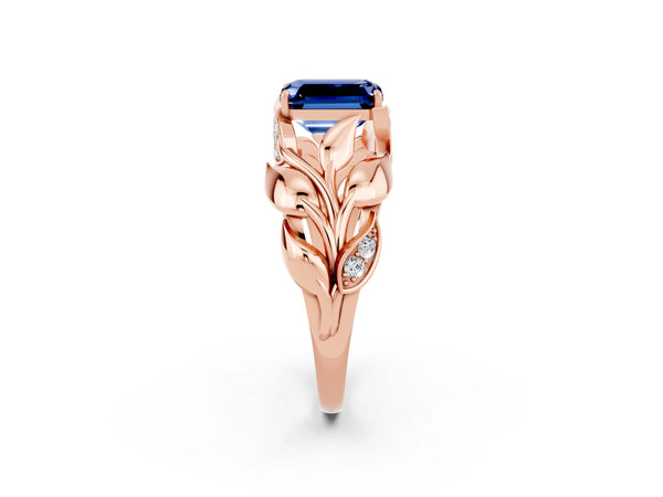 Rose gold Emerald Cut Blue Sapphire Leaf-Inspired Engagement Ring with Round Accents and Prong Setting