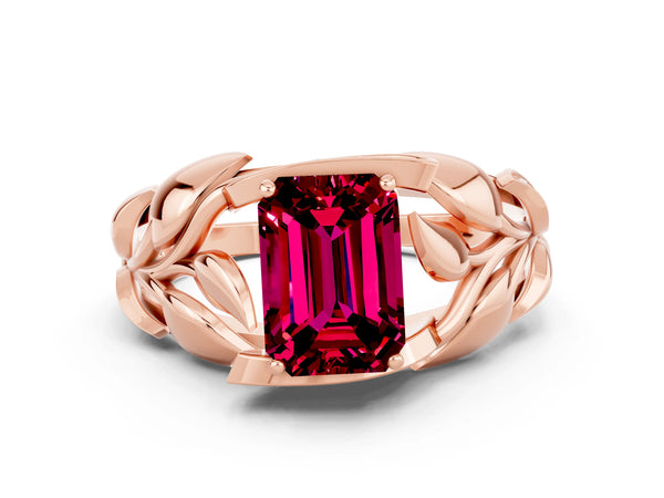 Rose gold Emerald Cut Garnet Leaf-Inspired Engagement Ring with Round Accents and Prong Setting