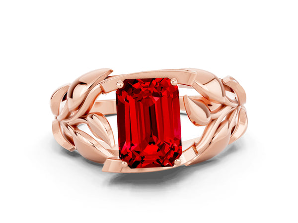 Rose gold Emerald Cut Ruby Leaf-Inspired Engagement Ring with Round Accents and Prong Setting