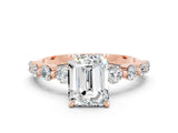 Rose gold Emerald Cut Solitaire Moissanite Ring with Pave Band and Four-Prong Setting