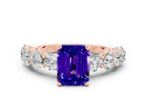 Rose gold Emerald Cut Tanzanite Prong Setting with Side Stones on a Pave Band