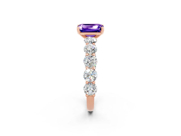Rose gold Emerald Cut Tanzanite Prong Setting with Side Stones on a Pave Band