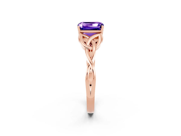 Rose gold Emerald Cut Tanzanite Solitaire Engagement Ring with Celtic Knot Band and Four-Prong Setting