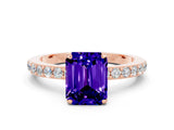 Rose gold Emerald Cut Tanzanite Solitaire Engagement Ring with Pavé Band and Four-Prong Setting