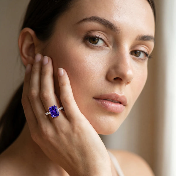 Rose gold Emerald Cut Tanzanite Solitaire Ring with Round  Pavé Band and Four-Prong Setting