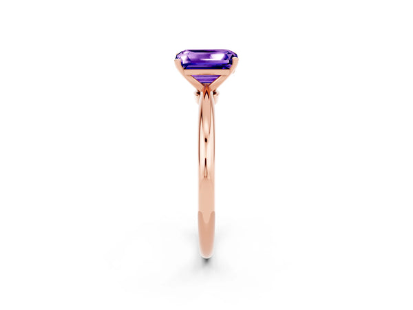 Rose gold Emerald Cut Tanzanite Solitaire Ring with Six-Prong Setting and Classic Band