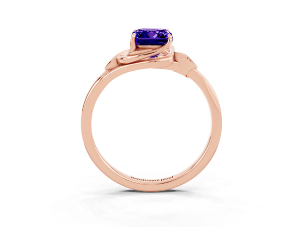 Rose gold Emerald Cut Tanzanite Solitaire Ring with Twist Band and Four-Prong Setting