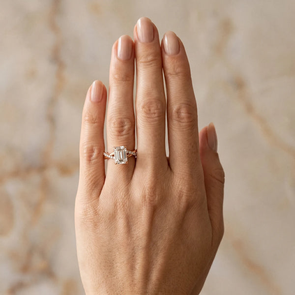 Rose gold Emerald Cut Twist Band Solitaire Diamond Ring with Pavé Setting