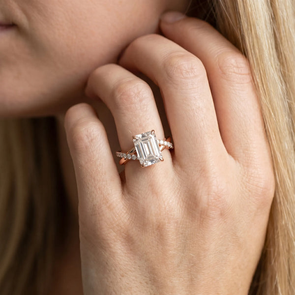 Rose gold Emerald Cut Twist Band Solitaire Diamond Ring with Pavé Setting
