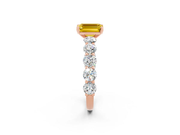 Rose gold Emerald Cut Yellow Sapphire Prong Setting with Side Stones on a Pave Band