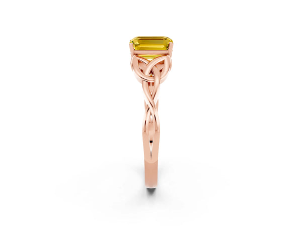 Rose gold Emerald Cut Yellow Sapphire Solitaire Engagement Ring with Celtic Knot Band and Four-Prong Setting