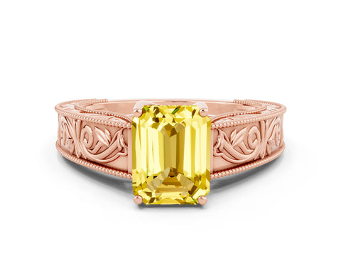 Rose gold Emerald Cut Yellow Sapphire Solitaire Ring with Engraved Band and Four-Prong Setting