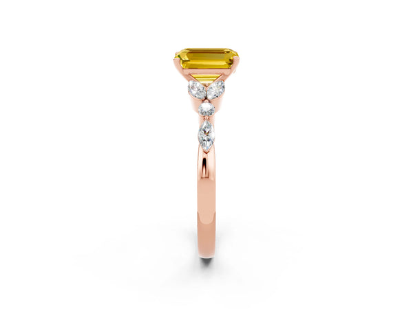 Rose gold Emerald Cut Yellow Sapphire Solitaire Ring with Side Stones and Four-Prong Setting