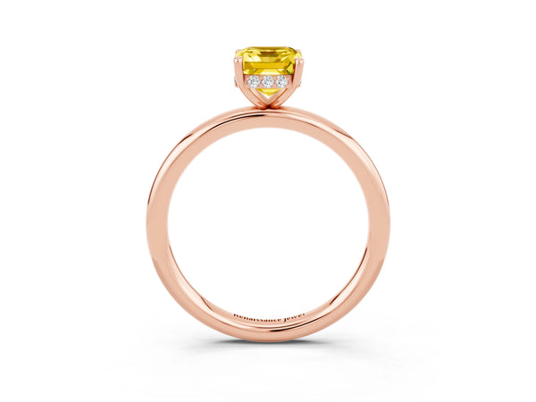 Rose gold Emerald Cut Yellow Sapphire Solitaire Ring with Thin Band and Four-Prong Setting
