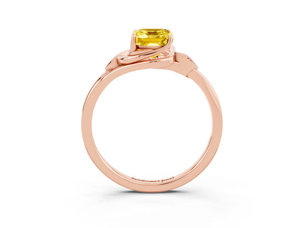 Rose gold Emerald Cut Yellow Sapphire Solitaire Ring with Twist Band and Four-Prong Setting