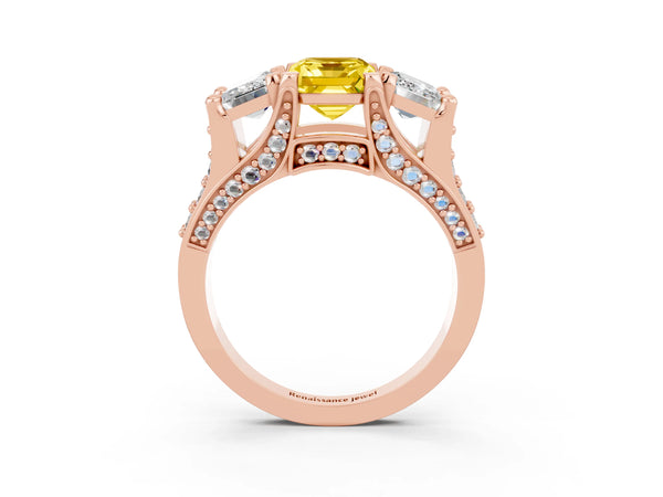 Rose gold Emerald Cut Yellow Sapphire Three-Stone Ring with Channel Set Band and Four-Prong Setting