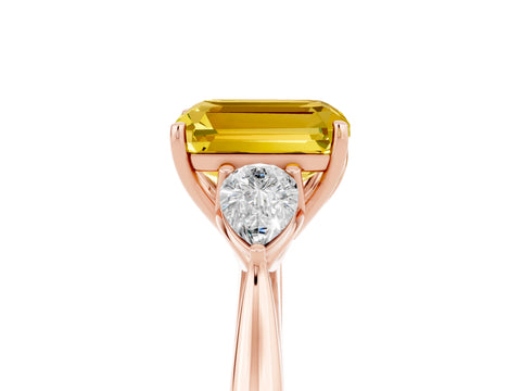 Rose gold Emerald Cut Yellow Sapphire Three-Stone Ring with Pear Side Stones and Four-Prong Setting_17