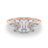 Rose gold Emerald Diamond Floral Cluster Ring with Marquise Side Stones and Six-Prong Solitaire Setting