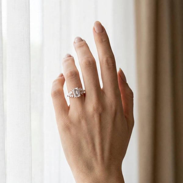 Rose gold Emerald Diamond Floral Side Stone Solitaire with Marquise Accents and Four-Prong Setting