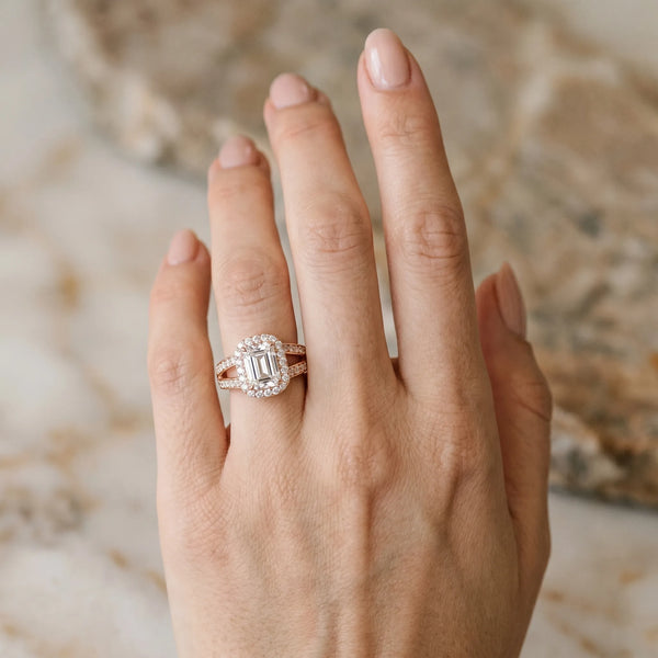 Rose gold Emerald Diamond Halo Ring with Split Shank Pavé Band and Four-Prong Setting