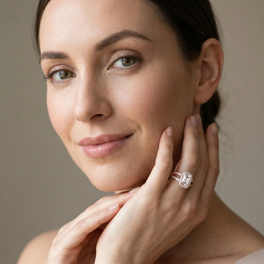 Rose gold Emerald Diamond Halo Ring with Split Shank Pavé Band and Four-Prong Setting