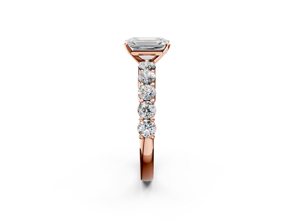Rose gold Emerald Diamond Solitaire Ring with Shared Prong Round Side Stones