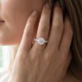 Rose gold Emerald Diamond Solitaire Ring with Shared Prong Round Side Stones_14