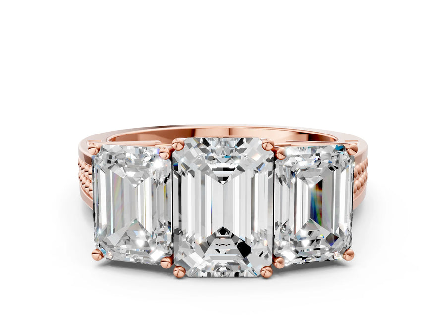 Rose gold Emerald Diamond Three-Stone Ring with Prong Setting and Textured Band