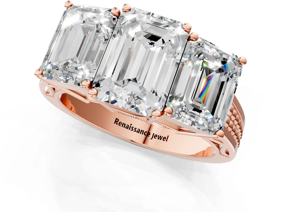 Rose gold Emerald Diamond Three-Stone Ring with Prong Setting and Textured Band