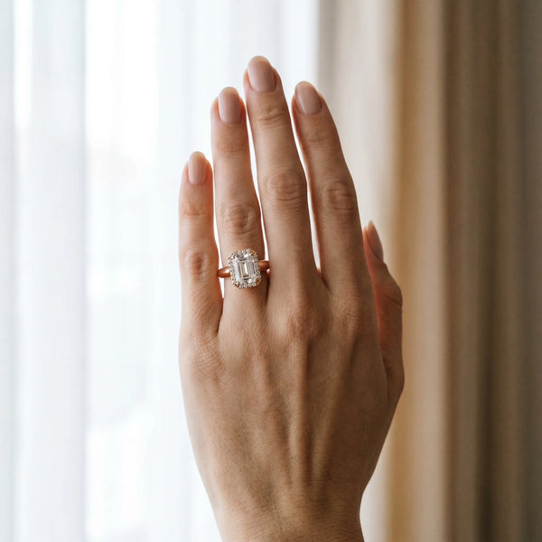 Rose gold Emerald Halo Diamond Ring with Cathedral Band and Four-Prong Setting