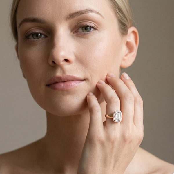 Rose gold Emerald Halo Diamond Ring with Cathedral Band and Four-Prong Setting