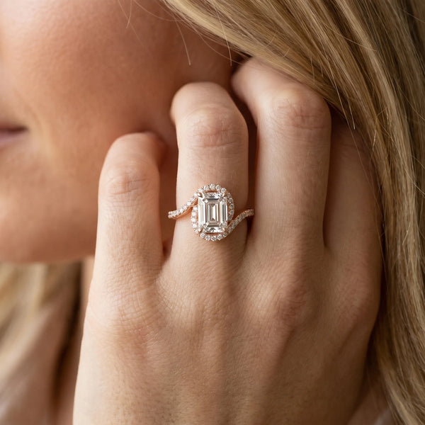 Rose gold Emerald Halo Twist Band with Four-Prong Setting