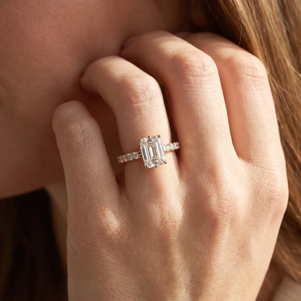 Rose gold Emerald Solitaire Diamond Engagement Ring with Pavé Band and Six-Prong Setting
