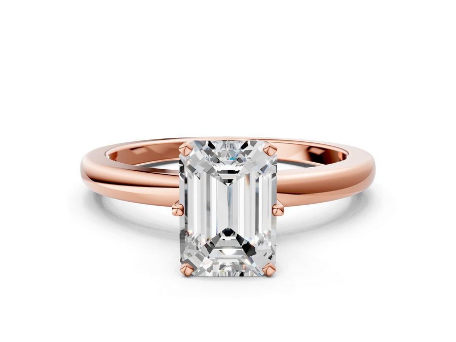Rose gold Emerald Solitaire Diamond Ring with Six-Prong Setting on a Classic Band