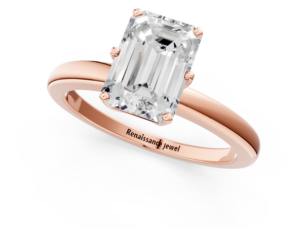 Rose gold Emerald Solitaire Diamond Ring with Six-Prong Setting on a Classic Band