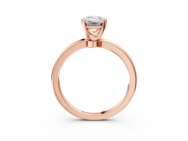 Rose gold Emerald Solitaire Diamond Ring with Six-Prong Setting on a Classic Band