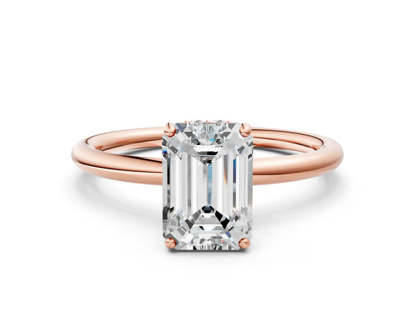 Rose gold Emerald Solitaire Diamond Ring with a Classic Band and Four-Prong Setting